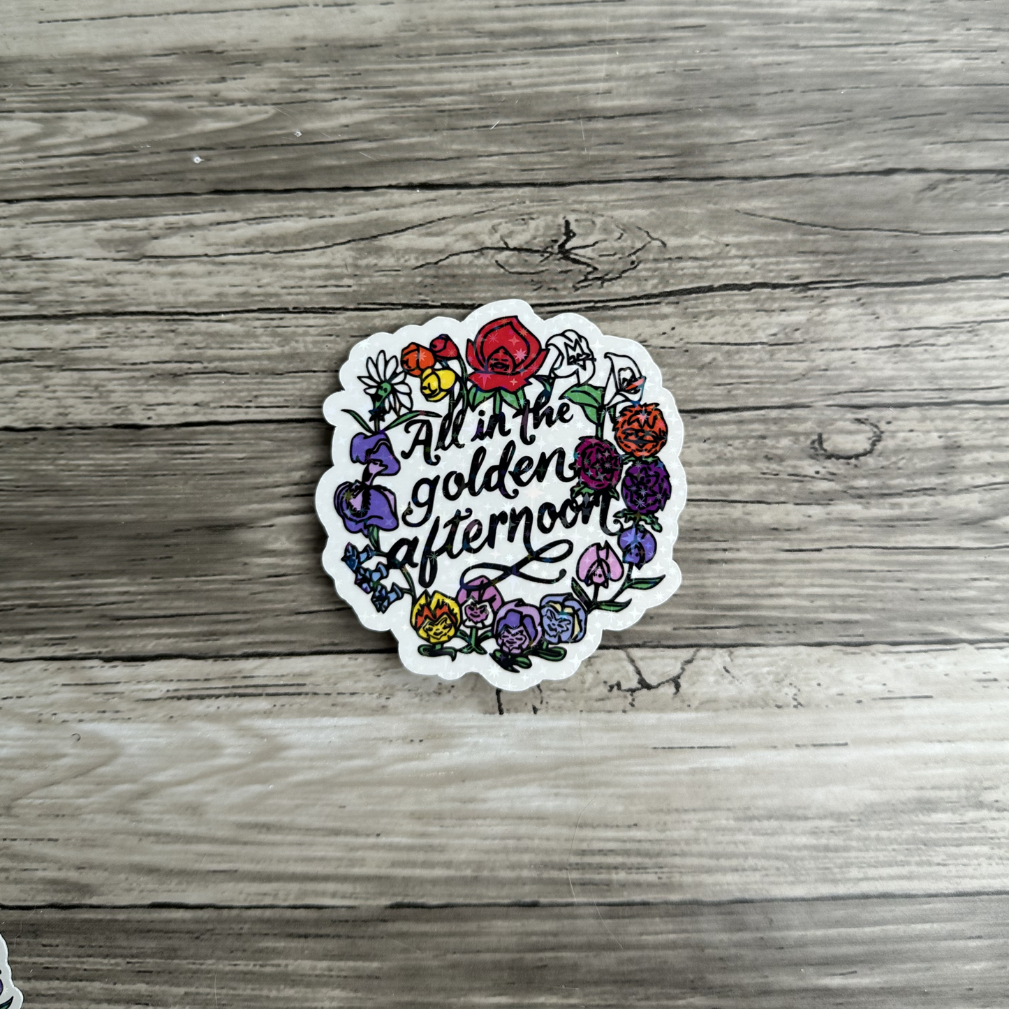 All in the golden afternoon sticker